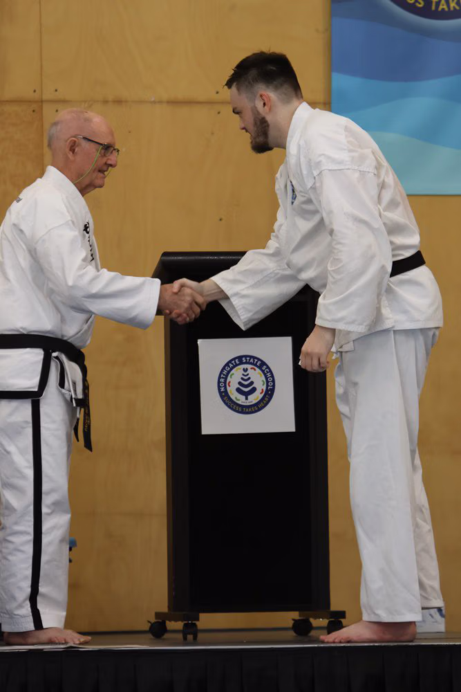 Stephen Clair presented with Black Belt