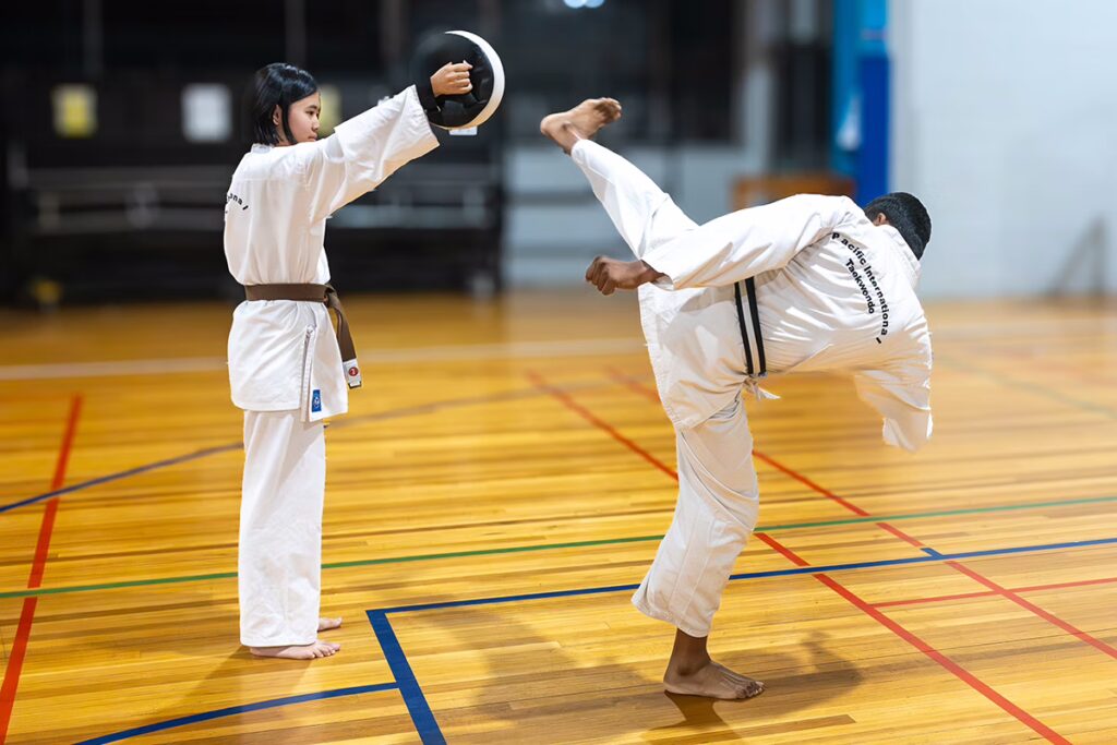 ALBANY CREEK male horizontal kicking pad facing away from camera