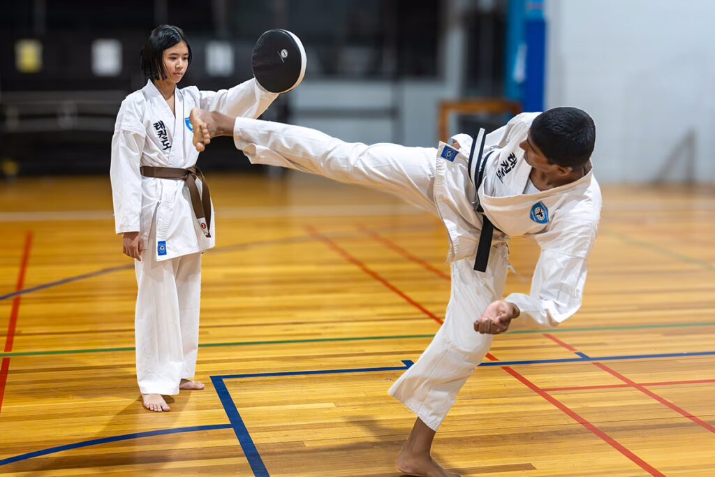 ALBANY CREEK male horizontal kicking pad facing camera copy