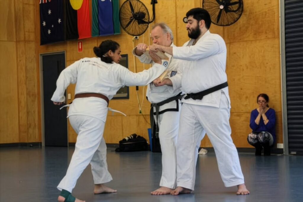 ANABEL GONZALEZ breaking a board